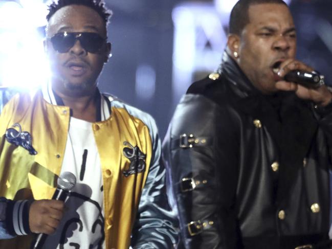 Q-Tip, from left, Phife Dawg, and Jarobi White, from A Tribe Called Quest, perform at the 59th annual Grammy Awards on Sunday, Feb. 12, 2017, in Los Angeles. (Photo by Matt Sayles/Invision/AP)