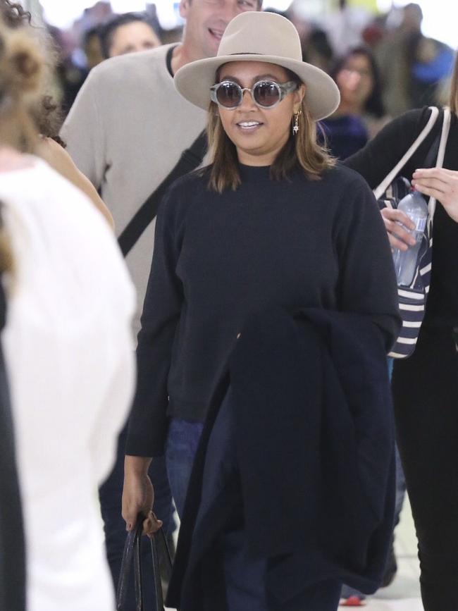 Pop icon Jessica Mauboy tried to fly under the radar while leaving the airport... Picture: Media Mode