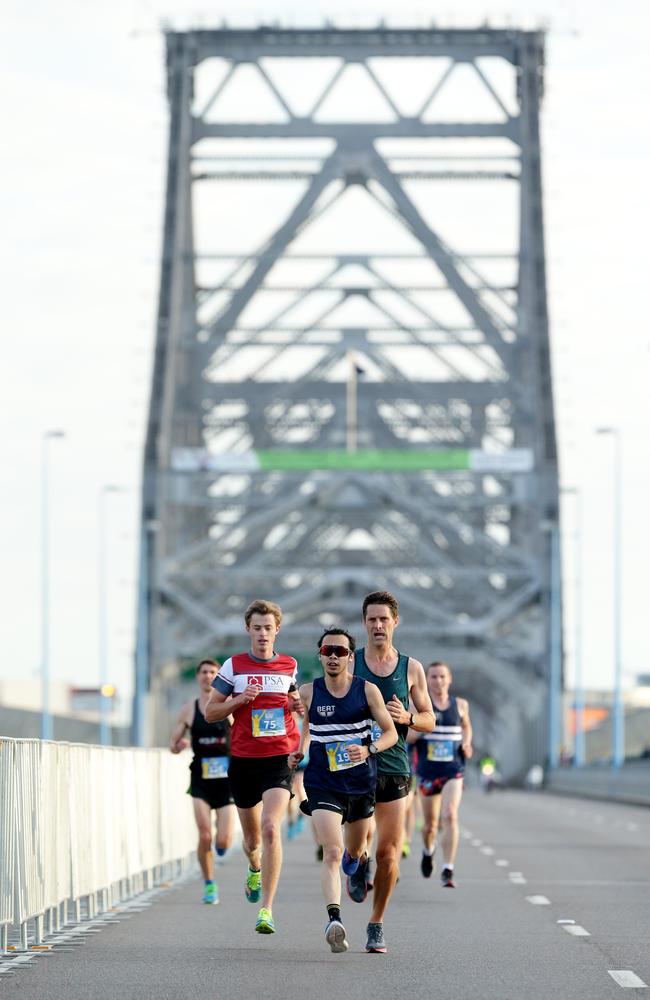 Serious competitors battle it out on the Story Bridge. Picture: AAP Image/Mark Calleja