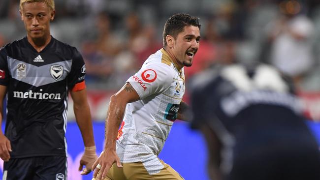 Newcastle’s Dimitri Petratos celebrates after scoring the Jets’ second goal against Melbourne Victory at GMHBA Stadium on Saturday. Picture: AAP
