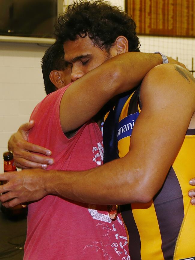 Cyril Rioli &amp; his dad embrace after the 2015 Grand Final. Picture: Wayne Ludbey