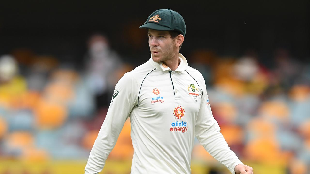 BRISBANE, AUSTRALIA - JANUARY 16: Tim Paine of Australia looks on during the rain delay during day two of the 4th Test Match in the series between Australia and India at The Gabba on January 16, 2021 in Brisbane, Australia. (Photo by Bradley Kanaris/Getty Images)