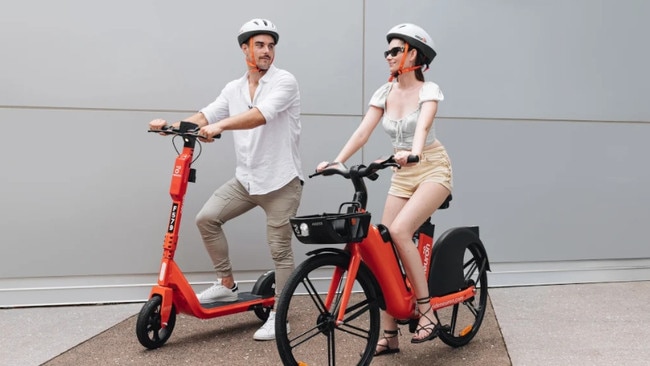 Robbie Turnbull and Veruschka Warde enjoy the Neuron eScooter and eBike. More eScooters are set to be added to the existing fleet in Darwin, while the eBike will be launched next month. Picture: Supplied