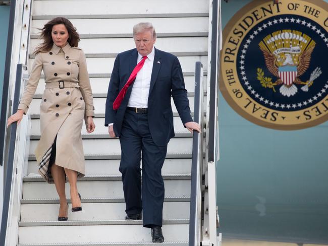 US President Donald Trump and US First Lady Melania Trump disembark from Air Force One as they arrive at Melsbroek Air Base in Haachtsesteenweg. Picture: AFP