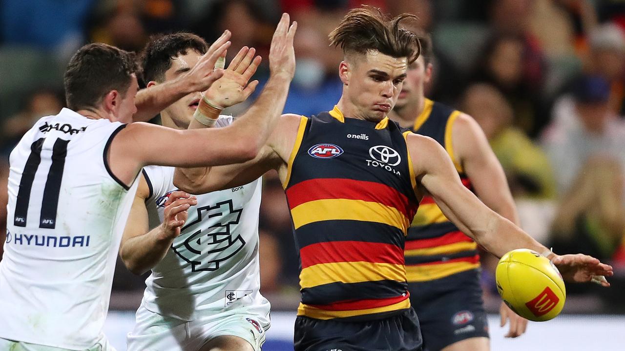 Ben Keays wins the ball in heavy traffic. Picture: Sarah Reed/AFL Photos via Getty Images