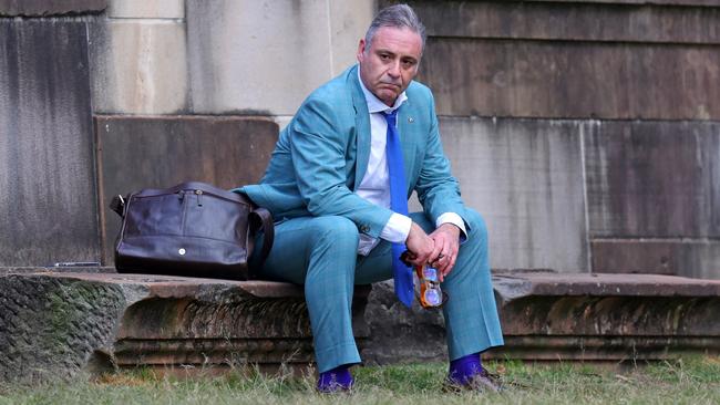 Andrew O’Keefe looks downcast as he sits alone on a park bench in Paddington. Picture: Backgrid