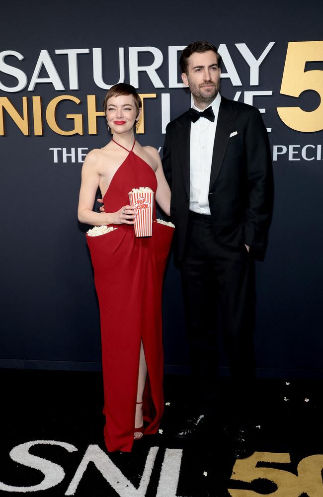 Yes, those are pockets full of popcorn built into Emma Stone’s dress. Picture: Getty Images via AFP