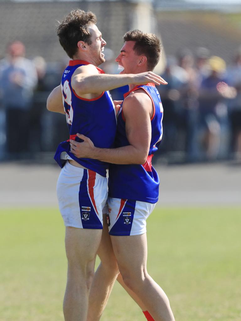 Driver celebrates one of his three goals against Colac in a qualifying final last year with Chris Hughes. Picture: Mark Wilson