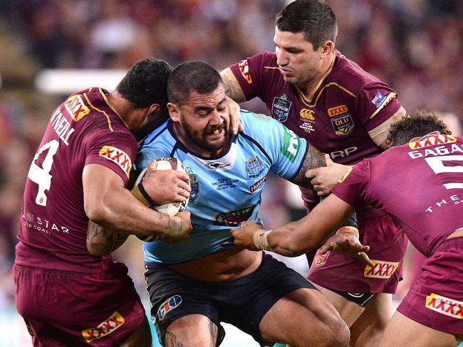 Andrew Fifita is tackled during game one at Suncorp Stadium. Picture: Getty Images