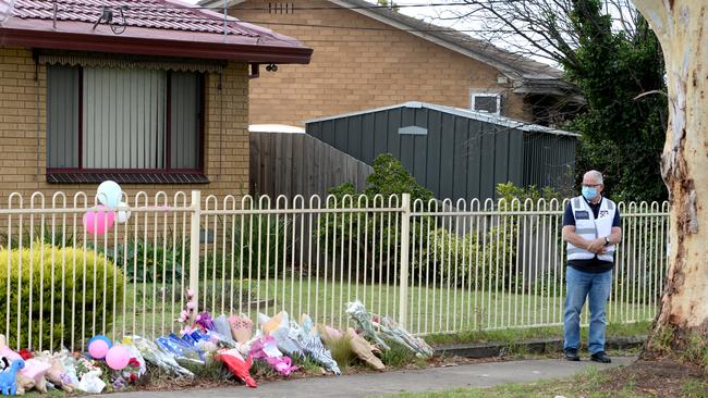 A chaplainat the scene of the murders in Tullamarine. Picture: Andrew Henshaw