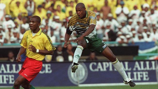 South Africa's Phil Masinga got airborne after driving the ball past the Congolese goalkeeper, to score his team's only goal in a 1-0 victory to qualify for the World cup in France in 1998.