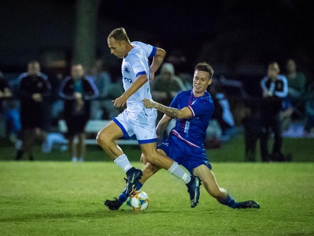 Surfers Paradise Apollo Gold Coast Premier League player Teddy Watson (white strip) in action against Robins in the semi-final at Lex Bell Oval on Saturday, November 7. Picture credit: East End Digital.