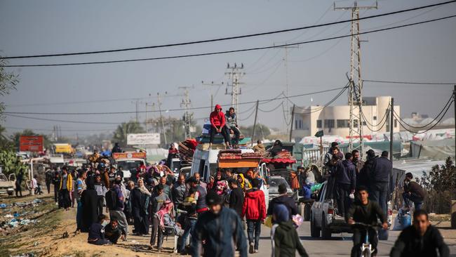 Palestinian citizens displaced from the city of Khan Yunis due to Israeli raids travel to the city of Rafah, south of the Gaza Strip. Picture: Getty Images