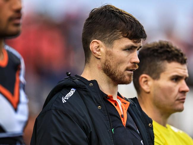 TAMWORTH, AUSTRALIA - MAY 11: An injured John Bateman of the Tigers watches play in the second half during the round 10 NRL match between Wests Tigers and Newcastle Knights at Scully Park, on May 11, 2024, in Tamworth, Australia. (Photo by Mark Evans/Getty Images)