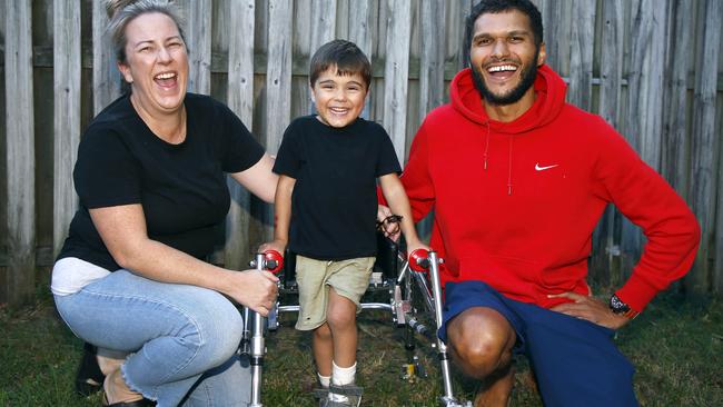 Alana Radford and Tim Scoble with their son Reef, 4, at their home in Labrador. Picture: Tertius Pickard