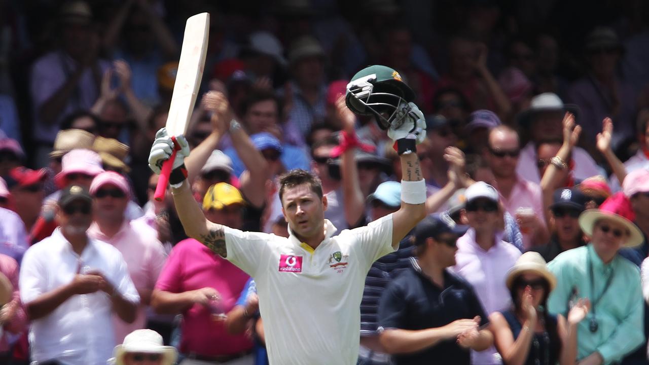 Australian cricket captain, Michael Clarke, gestures to a Louis Vuitton  cricket trunk in Sydney on Tuesday, Oct. 16, 2012. The trunk was designed  in collaboration with Clarke and will be auctioned with