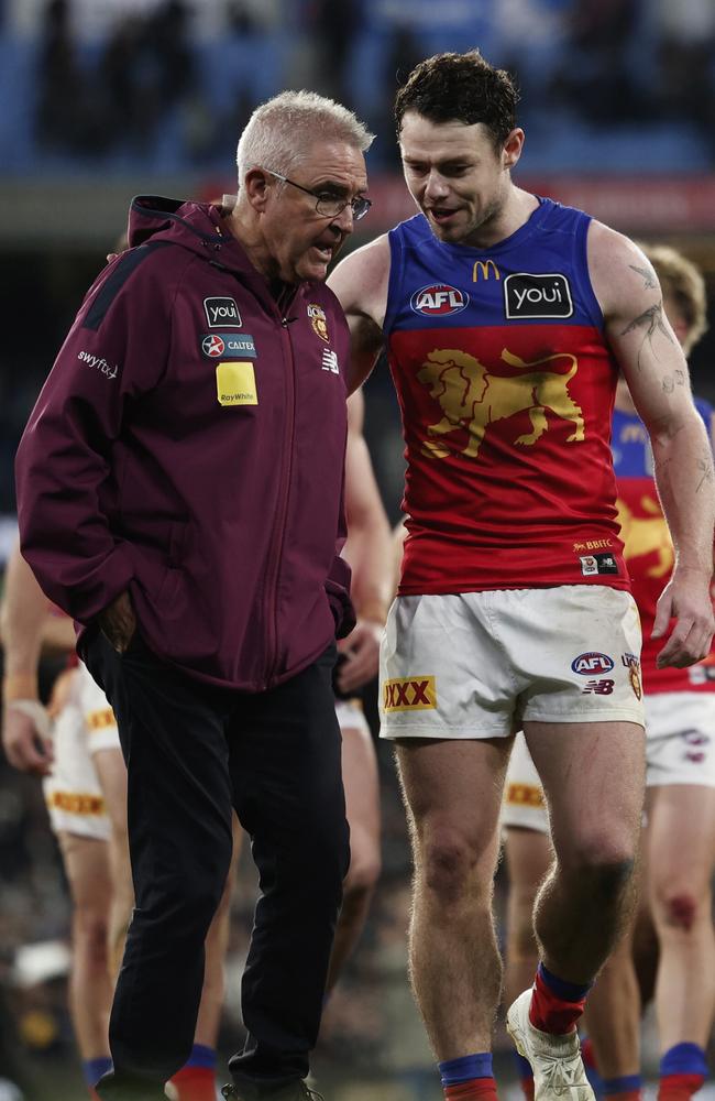 Lachie Neale and Chris Fagan speak after their win over Collingwood late in the season. Picture: Daniel Pockett/Getty Images.