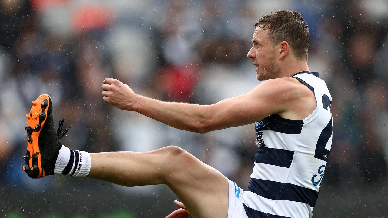 Mitch Duncan takes a kick for Geelong against West Coast at GMHBA Stadium on April 24, 2021.