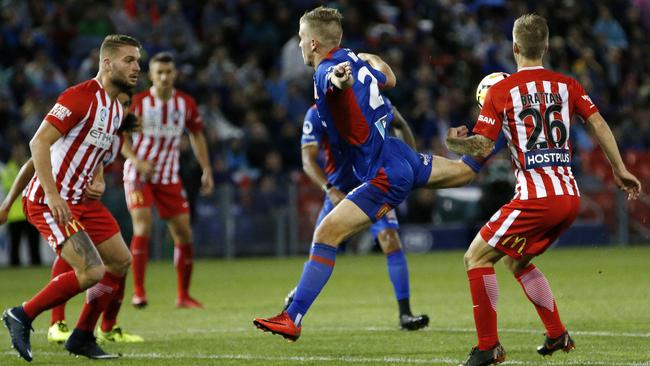 Riley McGree scores from a “scorpion’’ when playing for Newcastle in an A-League semi-final against Melbourne City last season. Picture: AAP