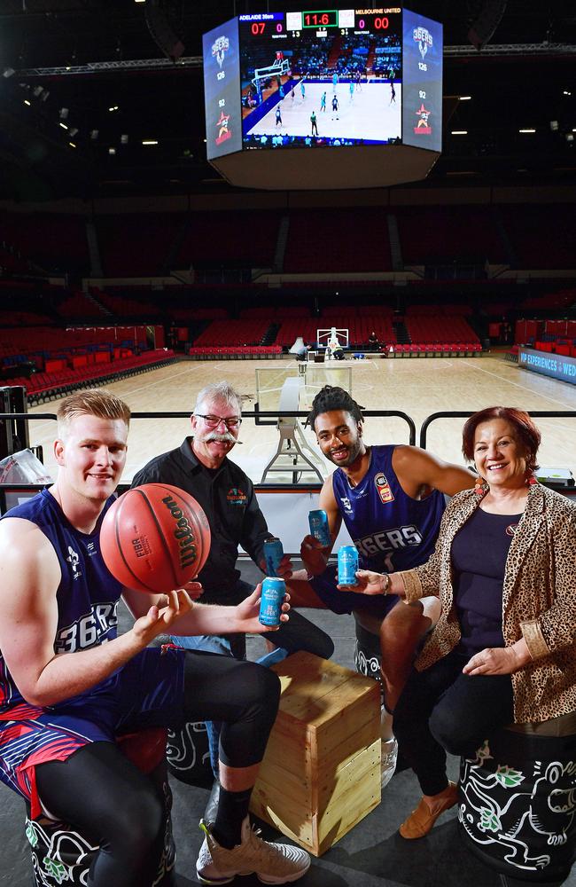 Adelaide 36ers players Harry Froling and Obi Kyei with new sponsors Corinna Steeb and Frank Samson from Prancing Pony Brewery at their new court side bar and party deck at the Adelaide Entertainment Centre. Picture Mark Brake