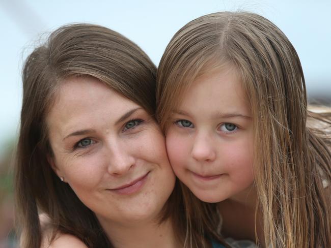 Migraine is the third most prevalent pain condition on Earth and yet there is virtually no funding for research. Rachel Weston and her daughter Jazmyn. Picture: David Crosling