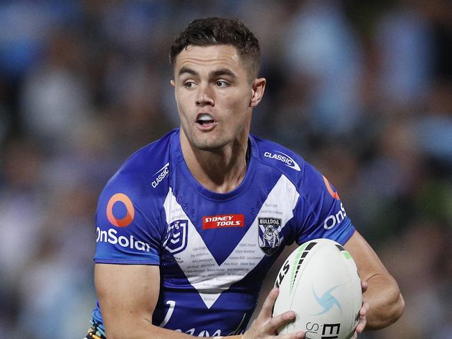 SYDNEY, AUSTRALIA - APRIL 24: Kyle Flanagan of the Bulldogs runs the ball during the round seven NRL match between the Cronulla Sharks and the Canterbury Bulldogs at Netstrata Jubilee Stadium, on April 24, 2021 in Sydney, Australia. (Photo by Jason McCawley/Getty Images)