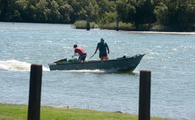 Police are investigating after a body was found in a bag. Fisherman yesterday took to the river unaware. Picture: John Gass