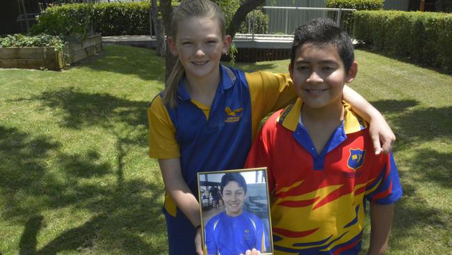 Danny Booth (left) is shaving and donating his hair in memory of his friend Aiden Preston's brother, Aaron, who passed away in 2020 from brain cancer, just shy of his 13th birthday. Picture: Morgan Burley