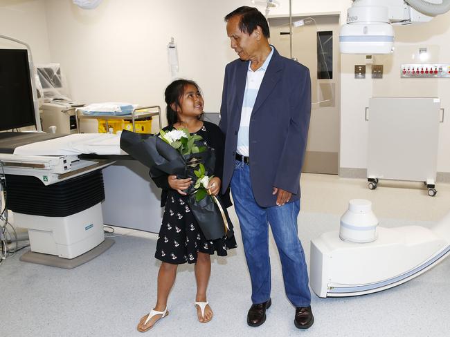 A Cardio Cathlab to diagnose and treat cardiac patients was opened at Bankstown-Lidcombe Hospital a year ago. Here, the first patient Ernesto Hernandez with granddaughter Chelsea Villanveva. Picture: John Appleyard