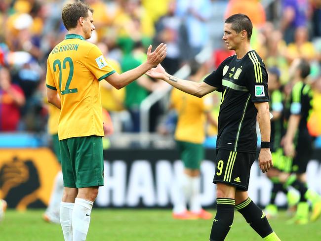 Alex Wilkinson congratulates Fernando Torres in Brazil.