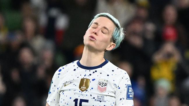 Megan Rapinoe reacts after failing to score in the penalty shootout loss to Sweden. (Photo by WILLIAM WEST / AFP)