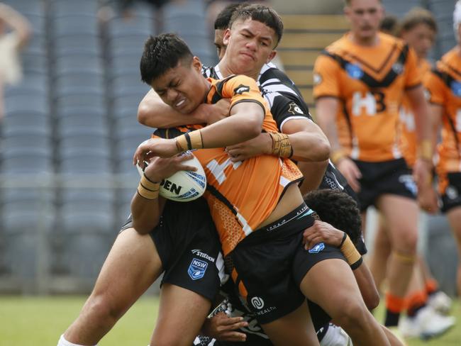 Emu Plains centre FilipeHuahulu shows his strength for Balmain in SG Ball. Picture Warren Gannon Photography