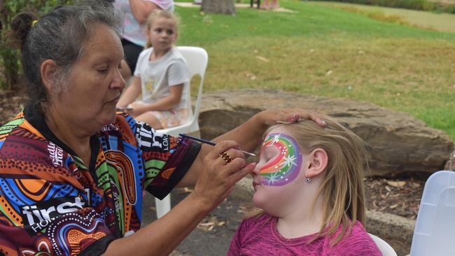 Hayley getting her face painted at the Great Australian Bites Australia Day event 2023. Picture: Chloe Cufflin.