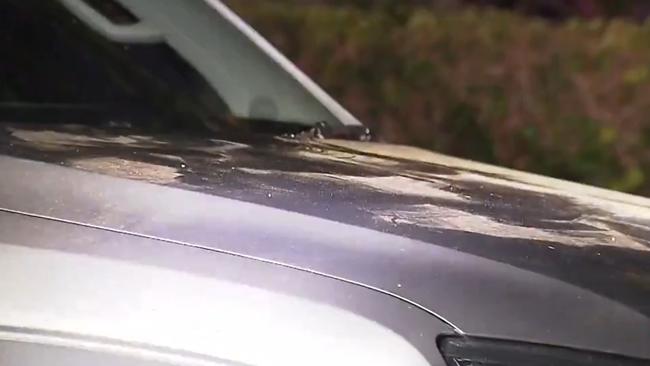 Finger print dust could be seen on the car bonnet. Picture: 7 NEWS