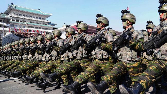 South Korea is openly considering building its own nuclear arsenal as it no longer believes the US will honour its nuclear guarantee in a showdown with North Korea, writes Professor Joseph M. Siracusa. Pictured are North Korean soldiers marching during a military parade in 2018. Picture: AFP PHOTO / KCNA via KNS /JIJI PRESS)