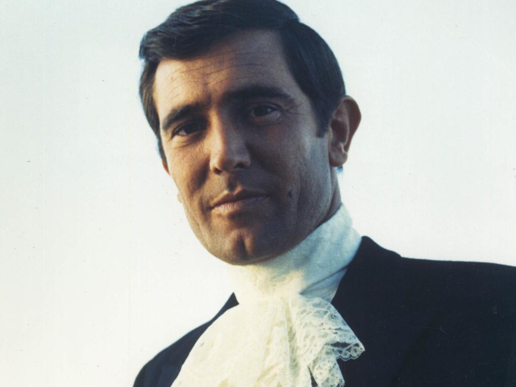 George Lazenby as James Bond.