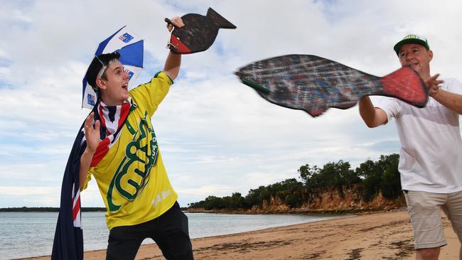 Mitch Danks and Andrew Thain get some practice in for the Australia Day Barra Toss competition. Picture: Katrina Bridgeford