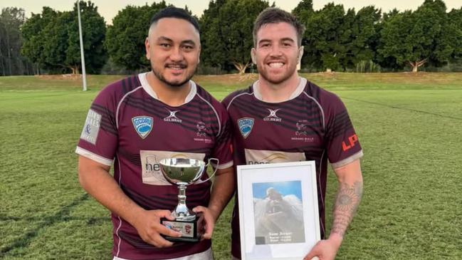 Nerang Bulls captain Sheldon Fidow (L) poses with the Navar Herbert Cup alongside debutant Kohan Herbert, Navar's younger brother, on May 24 2025. Picture: Vanessa Herbert