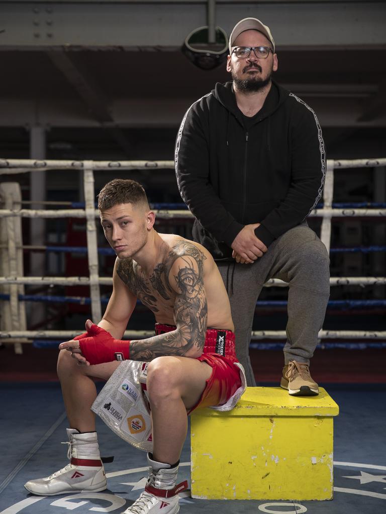 Boxer Liam Paro and trainer Alfie Di Carlo. Picture Peter Wallis