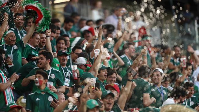 Fans of Mexico react. (Photo by Ryan Pierse/Getty Images)