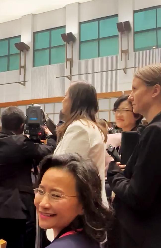 While sitting down with other journalists, she was suddenly encircled by visiting officials who tried to block her to ensure she did not appear in the video of the event.