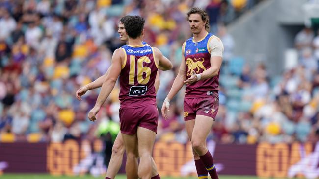 Joe Daniher (right) celebrates a goal with his Brisbane Lions teammates. Picture: Russell Freeman/AFL Photos via Getty Images