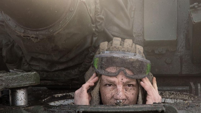 A member of the Ukrainian military, 59th Brigade, takes on new supplies in a tank. Picture: Chris McGrath/Getty Images/The Times