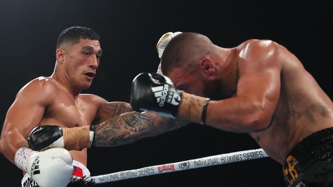 Opetaia punches Ben Kelleher during their cruiserweight bout in Brisbane last October. Picture: Getty Images