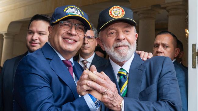 Gustavo Petro shake hands with Luiz Inacio Lula da Silva during the welcoming ceremony at the presidential palace in Bogota this month. Picture: AFP