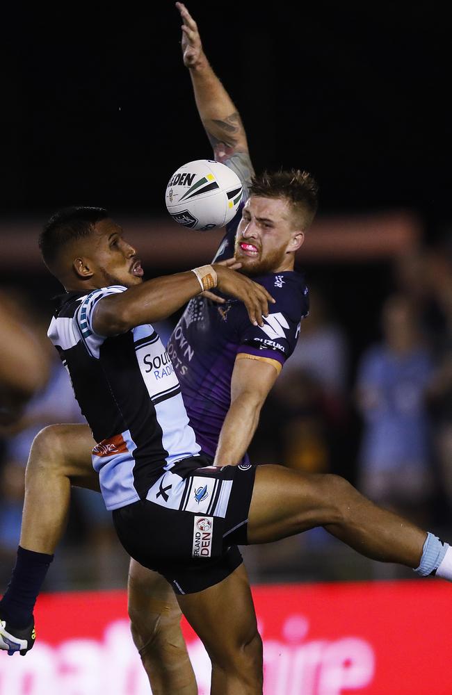 Ben Barba and Cameron Munster contest a bomb. Picture: Phil Hillyard