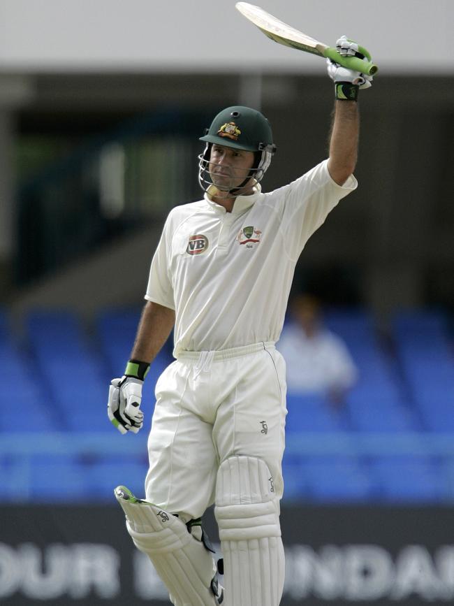 Ricky Ponting raises his bat to acknowledge the applause of the crowd after becoming the seventh player to score 10,000 runs during the second Test match against West Indies at the Sir Vivian Richards Stadium in St. John's, Antigua. Picture: AP