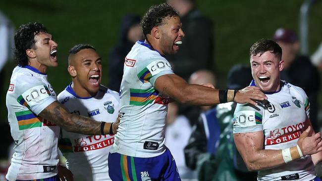 SYDNEY, AUSTRALIA - MAY 03:  Hudson Young of the Raiders celebrates with team mates after scoring a try during the round nine NRL match between Manly Sea Eagles and Canberra Raiders at 4 Pines Park on May 03, 2024, in Sydney, Australia. (Photo by Mark Metcalfe/Getty Images)