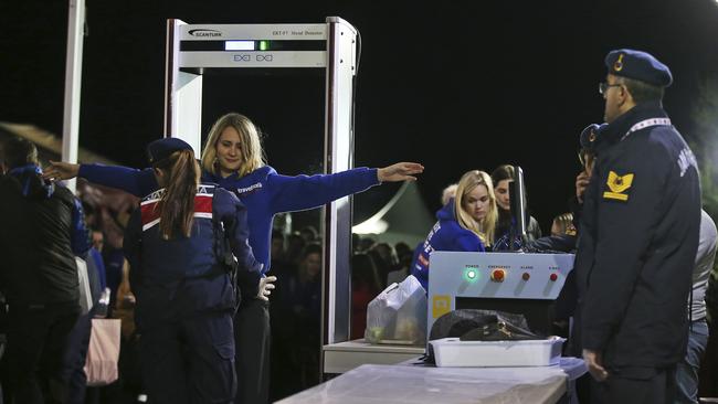 A woman is checked by Turkish military police at a security checkpoint in order to enter the Dawn Service ceremony at Anzac Cove. Picture: AP