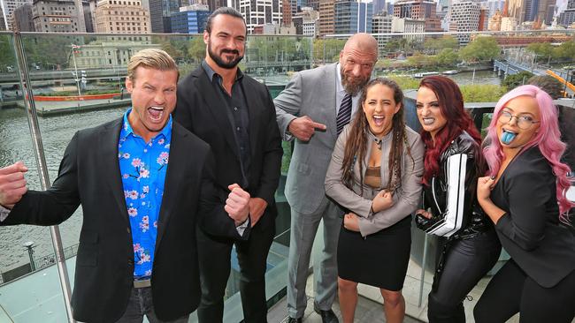 Wrestling stars Dolph Ziggler, Drew McIntyre, Triple H and  The Riott Squad (Sarah Logan, Ruby Riott and Liv Morgan) are ready to rumble the MCG. Picture: Mark Stewart